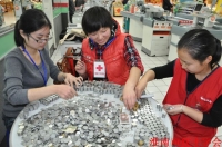 枚枚硬币皆关情----淮南市红十字志愿者6小时清点万枚硬币捐款